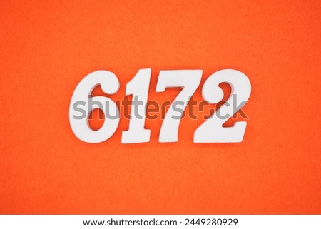 Orange felt is the background. The numbers 6172 are made from white painted wood.