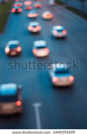 blurred background of a city street in the morning, defocused natural image of sunlight and cars