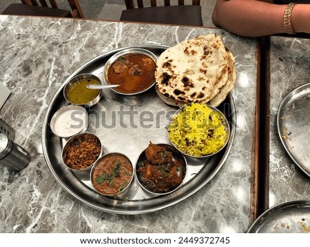 It is food tali nonveg tali it is delicious food try it  Royalty-Free Stock Photo #2449372745