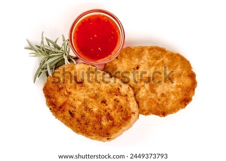 Fried pork cutlets in breadcrumbs, isolated on white background. High resolution image