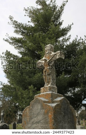 Old stone cross in the old graveyard.