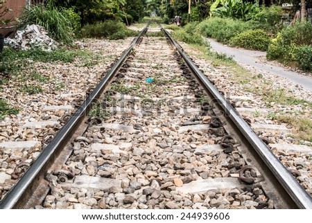 railway with concrete sleeper and rock. long railway show the destination not end early and we don't know about fortune and fate. 