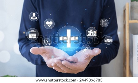 Health insurance, growth concepts.Male hand holding plus icon, Plus sign virtual and healthcare medical icon, health and access to welfare health.