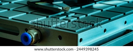 Experience precision with our Vacuum Clamping Plate. Ideal for CNC Milling, it ensures secure workpiece clamping. Enhance your CNC machining with our industrial vacuum plate. Royalty-Free Stock Photo #2449398245