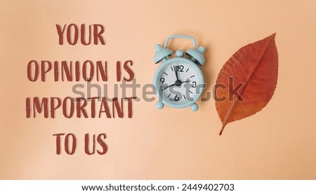 A clock with the hands on the numbers 3 and 9. The words Your opinion is important to us are written below the clock