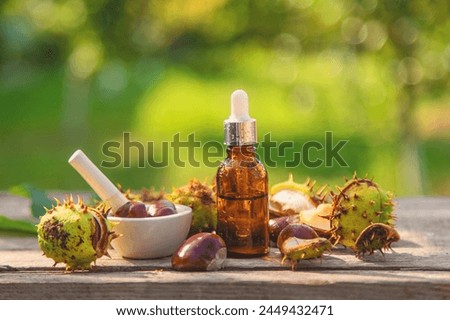 Horse chestnut extract in a bottle. selective focus. nature. Royalty-Free Stock Photo #2449432471