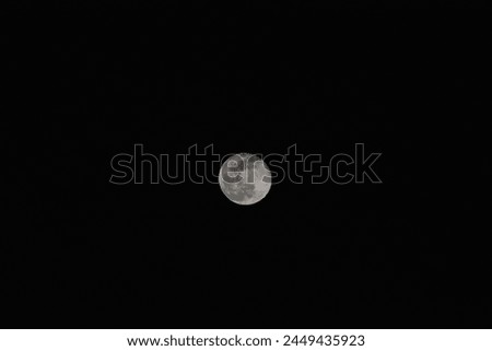 A clear picture of a full moon with a black background.Full moon