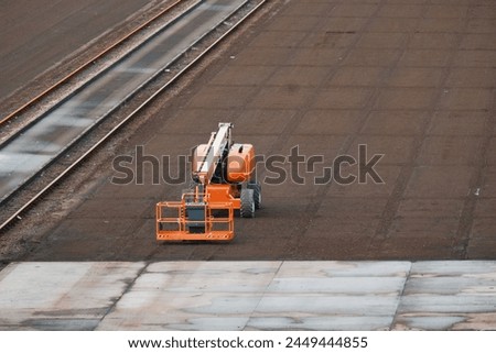 Remotely Operated Lifting Machine In The Empty Container Termina Royalty-Free Stock Photo #2449444855