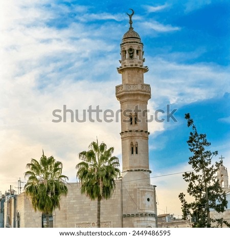 Islamic Mosque Minaret Tower Next To Church of Nativity Bethlehem West Bank Palestine.  Royalty-Free Stock Photo #2449486595