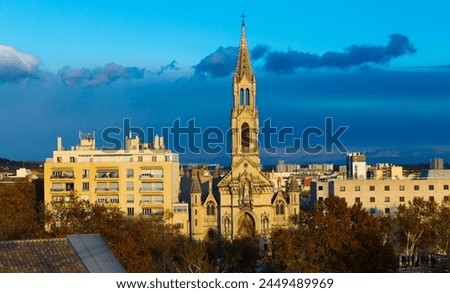 Cityscape of Nimes with Saint Perpetue and Sainte-Felicite Church, France Royalty-Free Stock Photo #2449489969