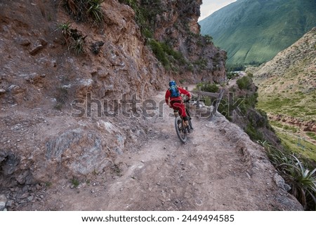 The Sacred Valley of Peru is not only a treasure trove of historical and cultural wonders but also a paradise for outdoor enthusiasts, including mountain bikers. Royalty-Free Stock Photo #2449494585