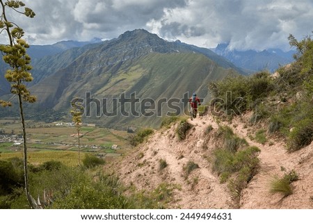 The Sacred Valley of Peru is not only a treasure trove of historical and cultural wonders but also a paradise for outdoor enthusiasts, including mountain bikers. Royalty-Free Stock Photo #2449494631