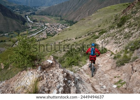The Sacred Valley of Peru is not only a treasure trove of historical and cultural wonders but also a paradise for outdoor enthusiasts, including mountain bikers. Royalty-Free Stock Photo #2449494637