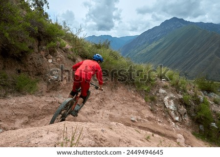 The Sacred Valley of Peru is not only a treasure trove of historical and cultural wonders but also a paradise for outdoor enthusiasts, including mountain bikers. Royalty-Free Stock Photo #2449494645