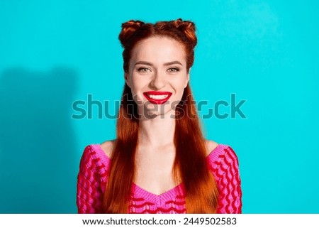 Photo of pretty cute lady dressed pink knitted shirt smiling isolated blue color background