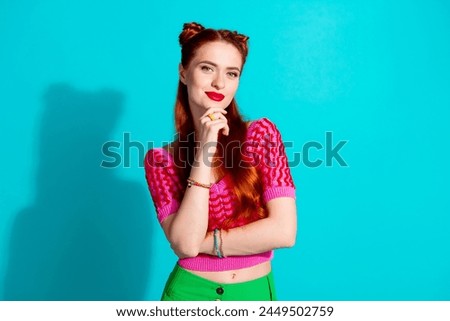 Photo of dreamy pretty lady dressed pink knitted shirt arm chin smiling isolated blue color background Royalty-Free Stock Photo #2449502759