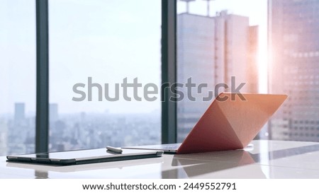Unattended office with laptop PC. Royalty-Free Stock Photo #2449552791