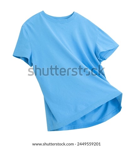 Blue flying t-shirt isolated on white. Single object. Clothing,casual clothes. Royalty-Free Stock Photo #2449559201
