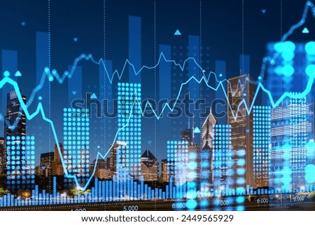 A hologram of financial graphs superimposed on a nighttime city skyline, representing future technology and business concepts. Double exposure Royalty-Free Stock Photo #2449565929