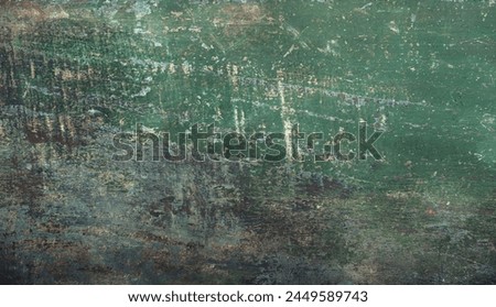 A high-resolution image capturing the intricate patterns and weathering of a green textured surface, ideal for backgrounds and overlays.