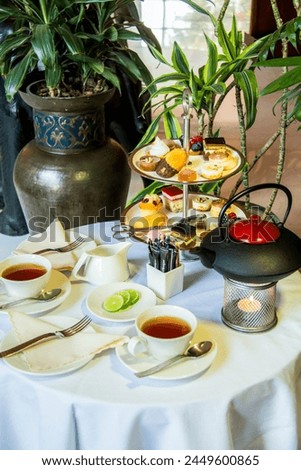 Tea table with desserts for morning breakfast or afternoon tea, Photo is selective focus with shallow depth of field. Taken at Cairo Egypt