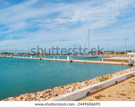 Empty pier in the resort of Varadero, Cuba. Lack of tourists due to the Cuban American crisis. Marina without yachts and boats. Internacional Dive Center Gaviota Las Morlas. Tourist port without boats Royalty-Free Stock Photo #2449606695