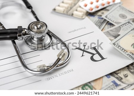 blank rx  doctors prescription doc with stethoscope and dollars, pills on desk. Expensive healthcare, medicine concept