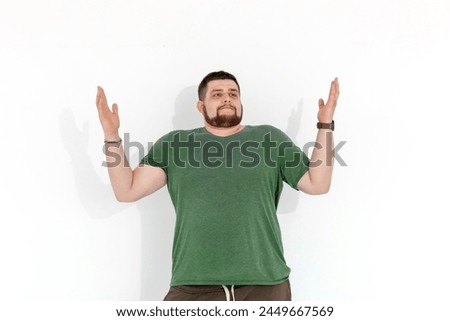 european fat young man emotions of pain on white background. High quality photo