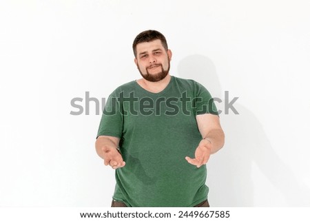 european fat young man emotions of pain on white background. High quality photo