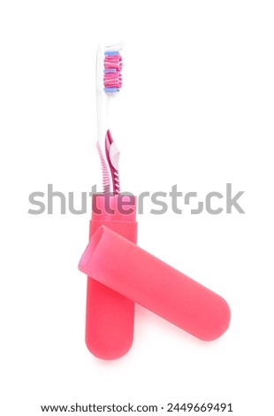 Red toothbrush in case on white background Royalty-Free Stock Photo #2449669491