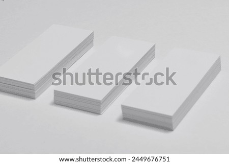 Photo of business cards. Template for branding identity. For graphic designers presentations and portfolios. Blank business cards on white background. Mockup for branding identity