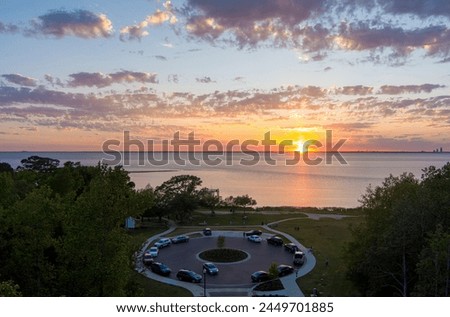 Aerial view of Bayfront Park at sunset on the Eastern shore of Mobile Bay in Daphne, Alabama