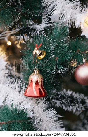 christmas bells hanging on christmas tree