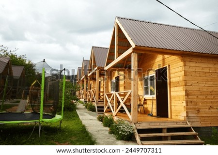  A row of wooden houses to accommodate tourists. 