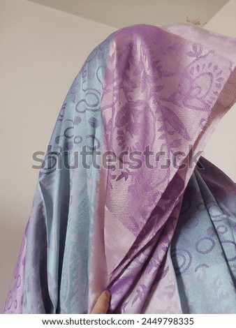 women's headscarf, pink blue clothes, silk fabric. High quality photo