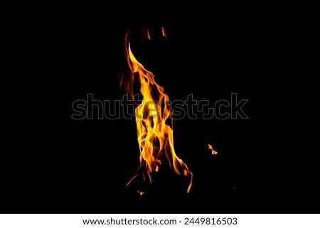 Fire flame texture. Burning material backdrop. Burn effect pattern. Blaze and torch wallpaper. Heat and haze backdrop. Exploison and hot background.