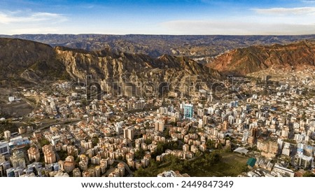La Paz, Bolivia, aerial view flying over the dense, urban cityscape. San Miguel, southern distric. South America Royalty-Free Stock Photo #2449847349