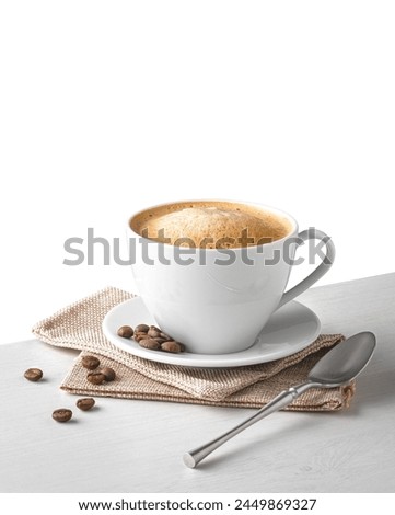 Coffee cup and beans on a white background.	