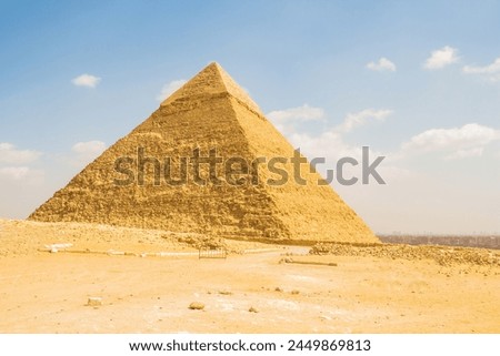 Archeology photography, Seven Wonders of the World. Great Pyramids of Giza, Chephren Pyramid, Photo is selective focus with shallow depth of field. Taken Cairo Egypt on 6 March 2023