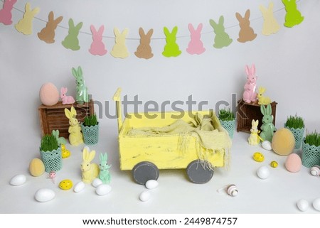Easter photo zone for a photo shoot. Background texture with Easter bunnies