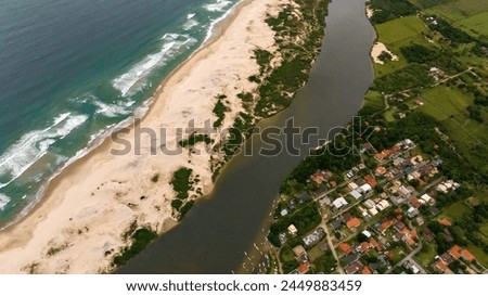 Guarda do Embau Beach located in the state of Santa Catarina near Florianopolis. Aerial image of beach in Brazil, South America.