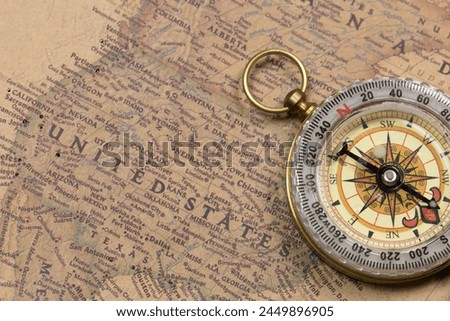 Retro vintage compass with vintage map