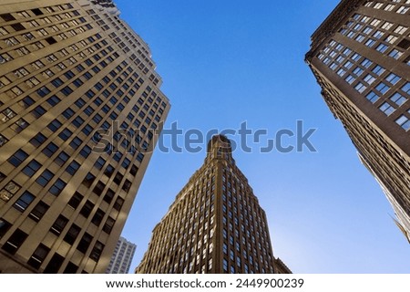 Skyscrapers business office buildings dominate Manhattan landscape of New York City USA modern urban landscape.