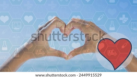 Image of heart and hands forming heart shape over medical icons. fashion and lifestyle concept digitally generated image.