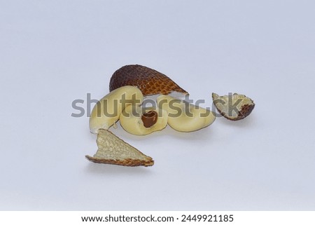 Snake fruit (Salacca zalacca) on isolated white background, clipping path