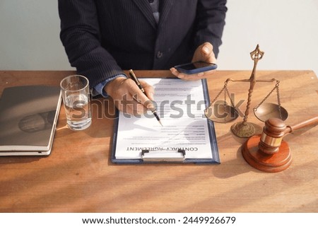 Male lawyer, skilled in jurisprudence, navigates legal matters, drafting contracts, advising clients, representing in court. Law ensures justice, balancing rights and responsibilities