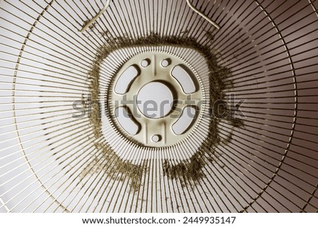 Pictures of dirty cover fan. Remove cover fan to clean. Contaminate on cover of fan.