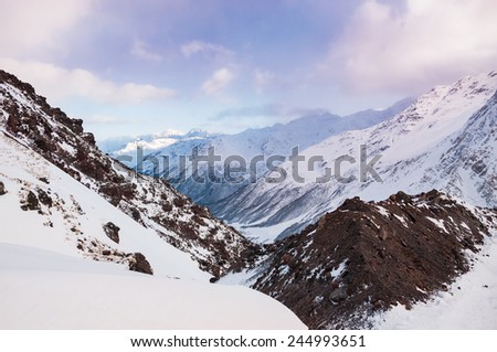 Mountain gorge at sunset. Ski resort Elbrus. Caucasus, Russian Federation. Beautiful winter landscape
