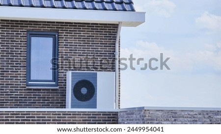 air source heat pump unit installed outdoors at a modern home with bricks in the Netherlands at spring, warmte pomp translation air source heat pump , eco friendly zero waste