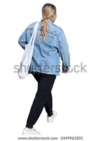 Close up view of a blonde girl walking. Cutout Woman in blue jean jacket walking with a wide stride down the street. Back view photo of a pedestrian. Denim and casual style. Cutout for 3d renderings